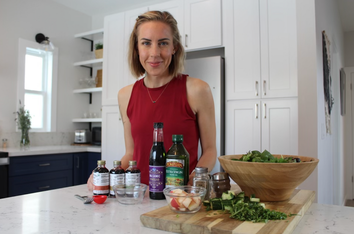 holly making salad dressing